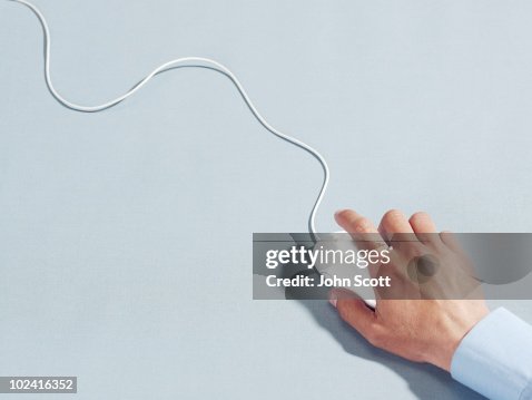 Man using computer mouse, close-up of hand Man using computer mouse, close-up of hand