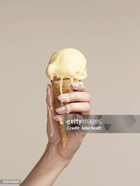 woman holding melting ice cream cone - human toe bildbanksfoton och bilder