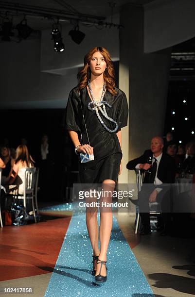 In this handout picture provided by the Scottish Fashion Awards, Amanda Hendrick in Swarovski Catwalk Show styled by Nathalie Colin attends at the...