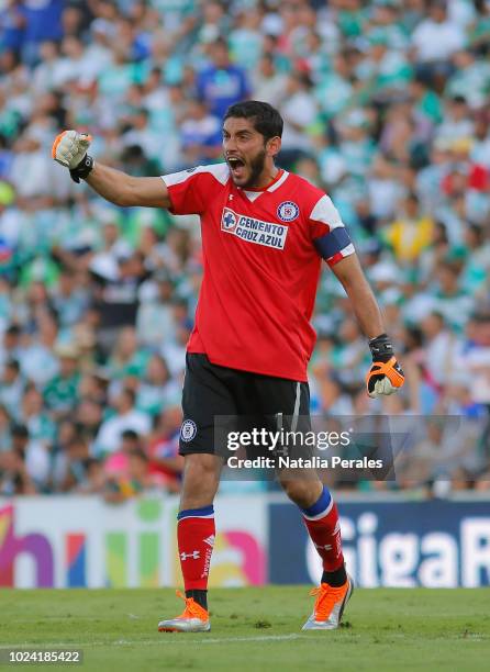 Jesus Corona of Cruz Azul celebrates the first goal of his team scored by his teammate Martine Cauteruccio during the 7th round match between Santos...