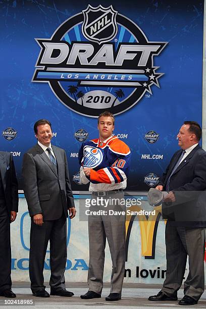 Taylor Hall, drafted overall by the Edmonton Oilers, puts on his jersy during the 2010 NHL Entry Draft at Staples Center on June 25, 2010 in Los...
