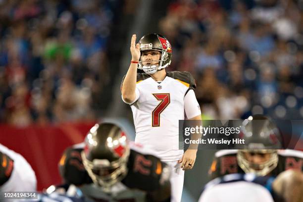 Chandler Catanzaro of the Tampa Bay Buccaneers lines up his extra point attempt during a game against the Tennessee Titans at Nissan Stadium during...