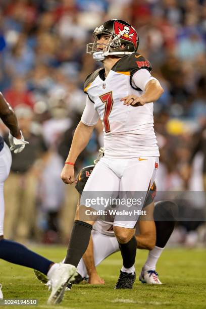 Chandler Catanzaro of the Tampa Bay Buccaneers kicks a extra point during a game against the Tennessee Titans at Nissan Stadium during week 2 of the...