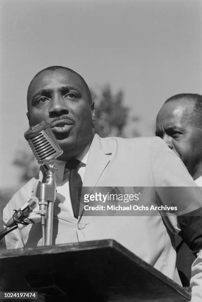 Comedian and activist Dick Gregory addresses a civil rights demonstration in Washington, DC, in the aftermath of the bombing of the 16th Street...