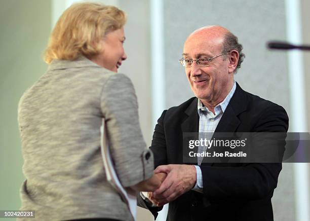 Ken Feinberg, Administrator of the Independent Claims Facility for BP's $20 billion escrow fund, and Senator Mary L. Landrieu, shake hands after a...