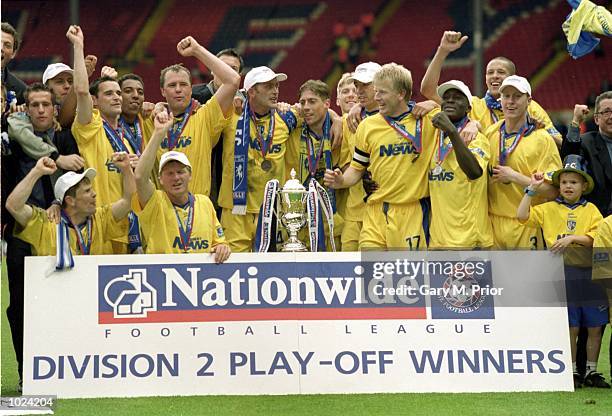 Gillingham celebrate after the Division 2 Play-Off Final against Wigan at Wembley Stadium, London, England. Gillingham won 3-2. \ Mandatory Credit:...