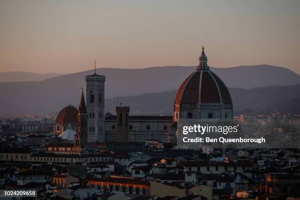 view over florence with brunelleschi's dome visible from the cathedral of santa maria del fiore - cupola stock pictures, royalty-free photos & images