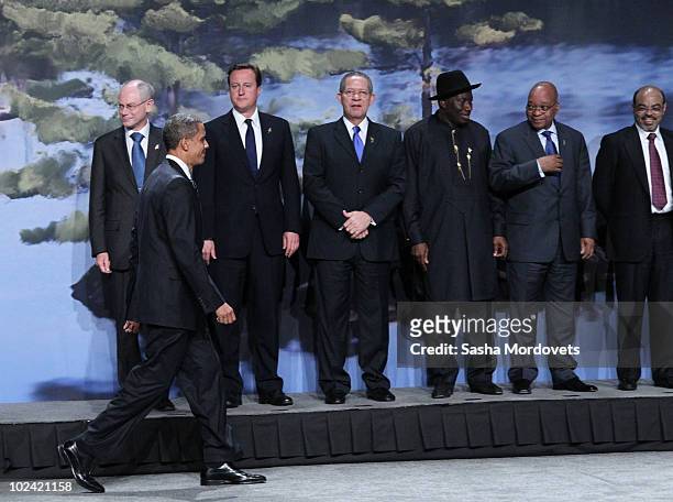 President Barack Obama arrives for a group photo session of G8 and outreach countries leaders at the G8 Summit on June 25, 2010 in Huntsville,...
