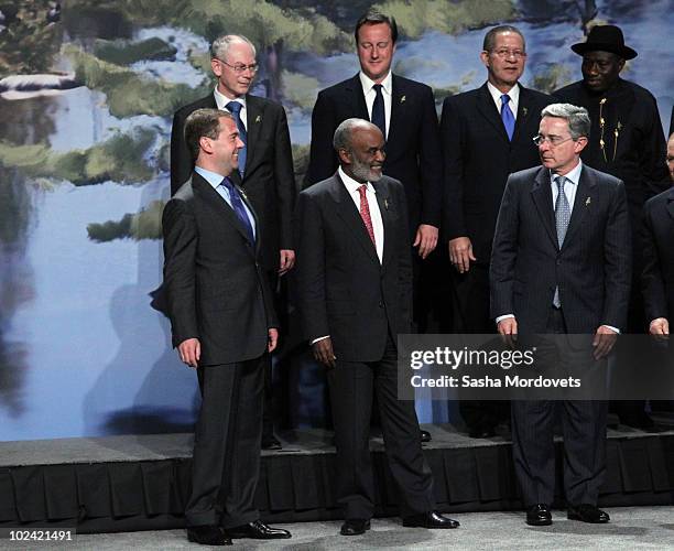 In lower row: Russian President Dmitry Medvedev, Haiti's President Rene Preval, Colombia's President Alvaro Uribe; L-R in upper row: EU President...