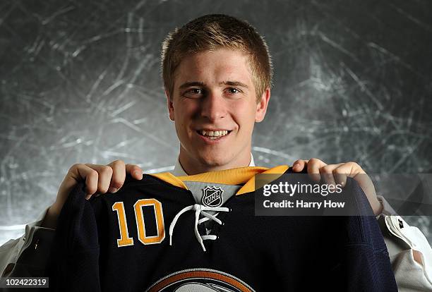 Mark Pysyk, drafted 23rd overall by the Buffalo Sabres, poses on stage during the 2010 NHL Entry Draft at Staples Center on June 25, 2010 in Los...