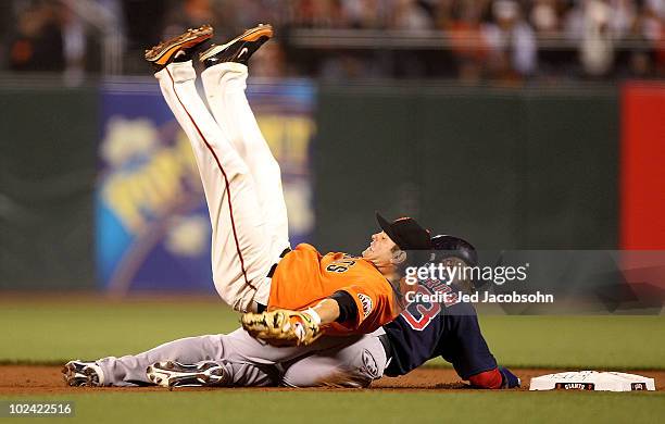 Freddy Sanchez of the San Francisco Giants is knocked over by Mike Cameron of the Boston Red Sox on a fielders choice hit by Kevin Youkilis in the...