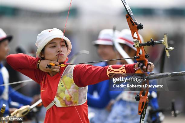 Xinyan Zhang of China shoots during Recurve Women's Team Archery Final Rounds on day nine of the Asian Games on August 27, 2018 in Jakarta, Indonesia.