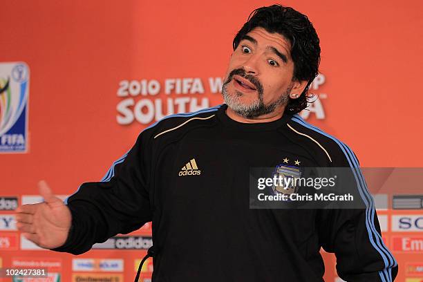 Argentina's head coach Diego Maradona gestures for photographers to leave a press conference at Loftus Versefeld Stadium on June 26, 2010 in...