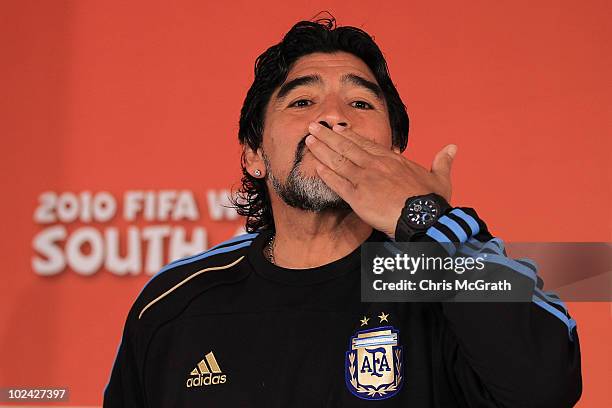 Argentina's head coach Diego Maradona gestures to a member of the media during a press conference at Loftus Versefeld Stadium on June 26, 2010 in...