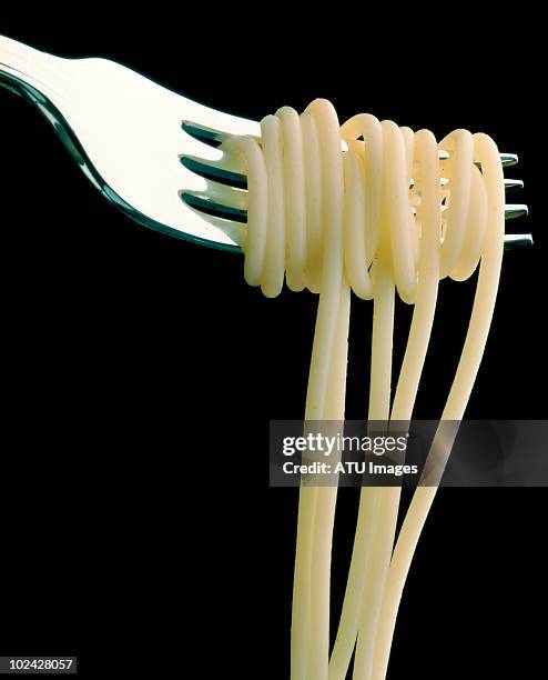 pasta on fork - spaghetti fork stock pictures, royalty-free photos & images