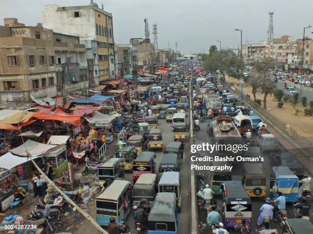 life going around streets of the city - pakistan culture stock pictures, royalty-free photos & images