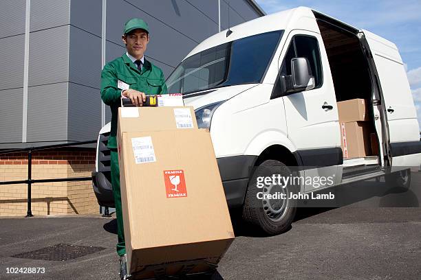 delivery man and van - mini van stock pictures, royalty-free photos & images