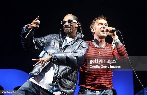 Snoop Dog performs with Damon Albarn of Gorillaz on the Pyramid Stage at Glastonbury Festival 2010 on June 25, 2010 in Glastonbury, England.