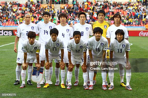 The South Korea team line up for a group photo prior to the 2010 FIFA World Cup South Africa Round of Sixteen match between Uruguay and South Korea...