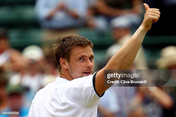 Robin Soderling of Sweden celebrates winning his match against Thomaz Bellucci of Brazil on Day Six of the Wimbledon Lawn Tennis Championships at the...