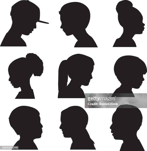 children profile head silhouettes - 6 7 years stock illustrations