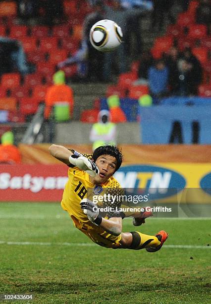 Jung Sung-Ryong of South Korea dives but cannot save Luis Suarez of Uruguay's second goal during the 2010 FIFA World Cup South Africa Round of...