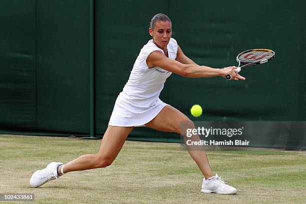 Flavia Pennetta of Italy in action during her match against Klara Zakopalova of Czech Republic on Day Six of the Wimbledon Lawn Tennis Championships...