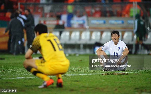 Lee Jung-Soo of South Korea shows his dejection after being knocked out of the competetion during the 2010 FIFA World Cup South Africa Round of...