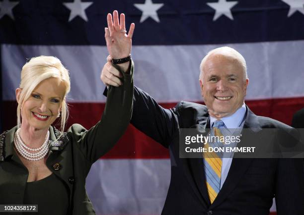 Arizona Senator and Republican presidential hopeful John McCain and his wife Cindy celebrate victory in the Florida Republican Presidential Primary...