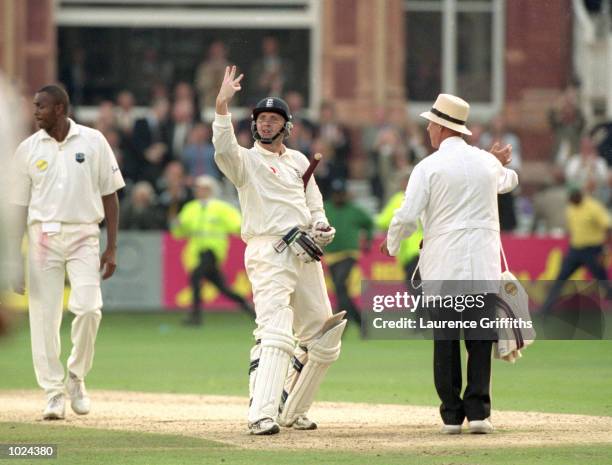 Dominic Cork of England celebrates the winning runs during the third day's play of the England v West Indies second Cornhill test match at Lord's...