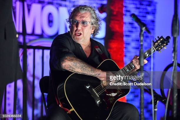 Rock and Roll Hall of Fame musician Steve Jones, founding member of Sex Pistols, performs onstage during the Johnny Ramone Tribute and Screening of...