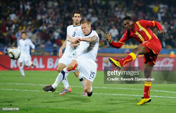Asamoah Gyan of Ghana scores his team's second goal in extra time during the 2010 FIFA World Cup South Africa Round of Sixteen match between USA and...
