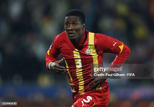 Asamoah Gyan of Ghana celebrates scoring his side's second goal during the 2010 FIFA World Cup South Africa Round of Sixteen match between USA and...