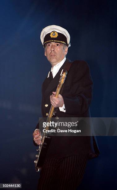 Mick Jones performs with Gorillaz on the Pyramid Stage at Glastonbury Festival 2010 on June 25, 2010 in Glastonbury, England.