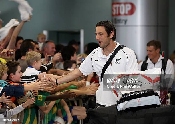 Ivan Vicelich and Ben Sigmund of the New Zealand All Whites greet the fans as they arrive home from the 2010 World Cup at the Auckland International...