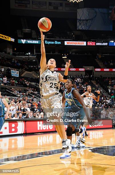 Becky Hammon of the San Antonio Silver Stars shoots against Hamchetou Maiga-Ba of the Minnesota Lynx on June 26, 2010 at the AT&T Center in San...