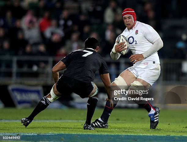 Dave Attwood of England runs with the ball during the international rugby match between the New Zealand Maori and England at McLean Park on June 23,...