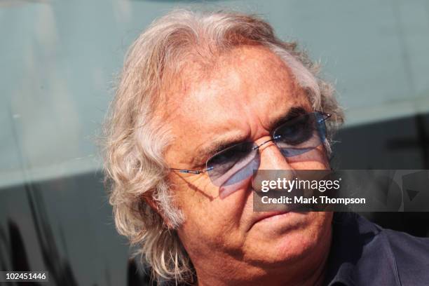Former F1 team boss Flavio Briatore is seen in the paddock before the European Formula One Grand Prix at the Valencia Street Circuit on July 27 in...