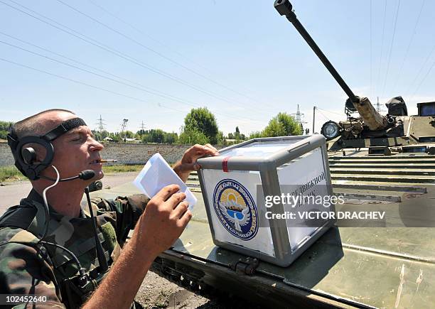 Kyrgyz soldier casts his vote in Osh, on June 27, 2010. Kyrgyzstan is to vote in a constitutional referendum that interim authorities insist is vital...