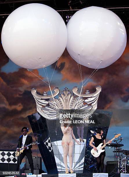 British singer Paloma Faith wears two giant helium-filled balloons while performing on the Pyramid stage on the final day of the Glastonbury festival...