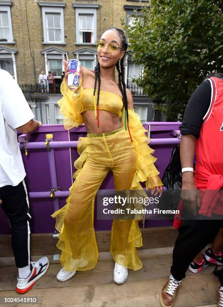 Jourdan Dunn poses on the Red Bull Music X Mangrove float at Notting Hill Carnival on August 27, 2018 in London, England.