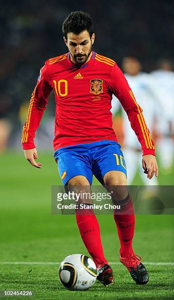Francesc Fabregas of Spain runs with the ball during the 2010 FIFA World Cup South Africa Group H match between Spain and Honduras at Ellis Park...