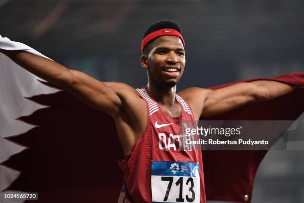 Abderrahman Samba of Qatar celebrates victory after winning Men's 400m Hurdles on day nine of the Asian Games on August 27, 2018 in Jakarta,...