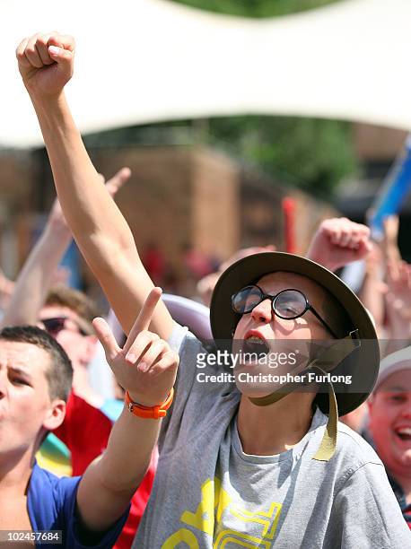 England fans cheer their team during the England v Germany World Cup match being shown on a giant screen in the Manchester fan zone on June 27, 2010...