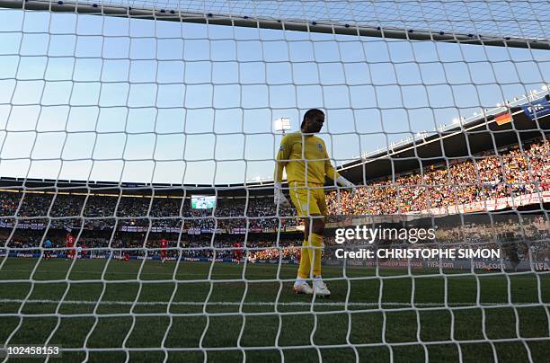 England's goalkeeper David James looks dejected after conceding a goal by Germany's striker Miroslav Klose during the 2010 World Cup round of 16...