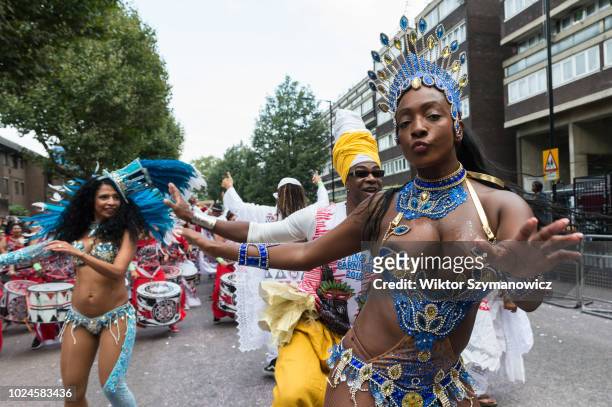 The grand finale of the Notting Hill Carnival, during which performers present their costumes and dance to the rhythms of the mobile sound systems or...