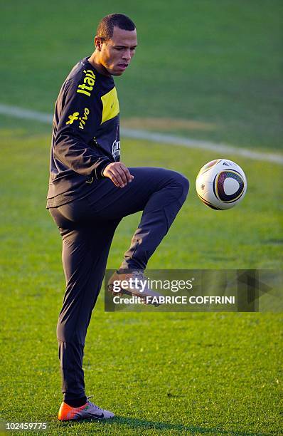 Brazil's striker Luis Fabiano controls the ball during a training session at Randburg High School in Johannesburg on June 27, 2010 during the 2010...