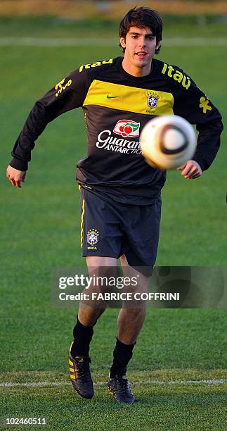 Brazil's midfielder Kaka runs behind the ball during a training session at Randburg High School in Johannesburg on June 27, 2010 during the 2010...