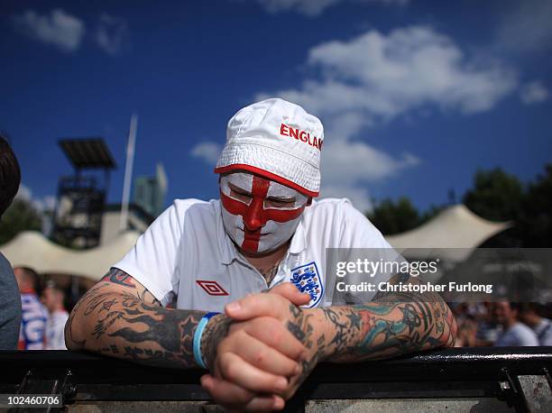 Fans react emotionally as they watch England lose 4-1 to Germany on a giant screen in the Manchester fan zone. On June 27, 2010 in Manchester,...