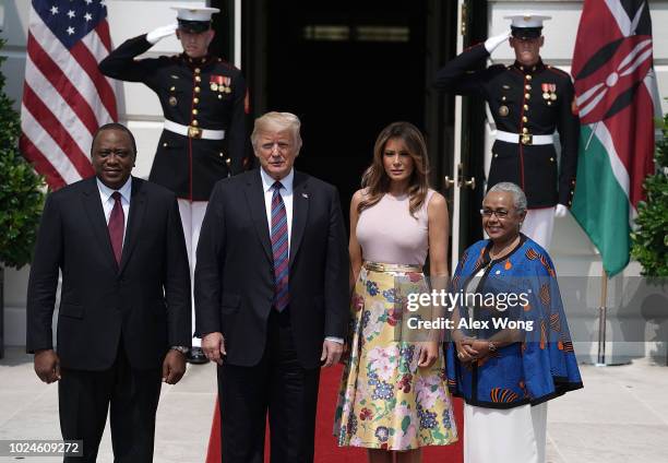 President Donald Trump and first lady Melania Trump welcome President Uhuru Kenyatta of Kenya and his wife Margaret Gakuo during a South Portico...